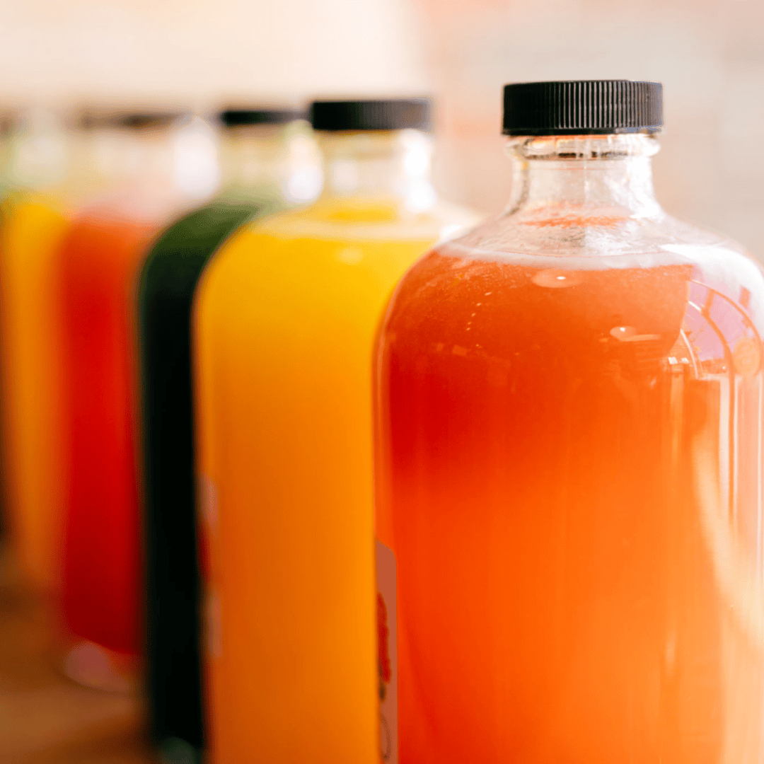 Variety of bottled juices lined up
