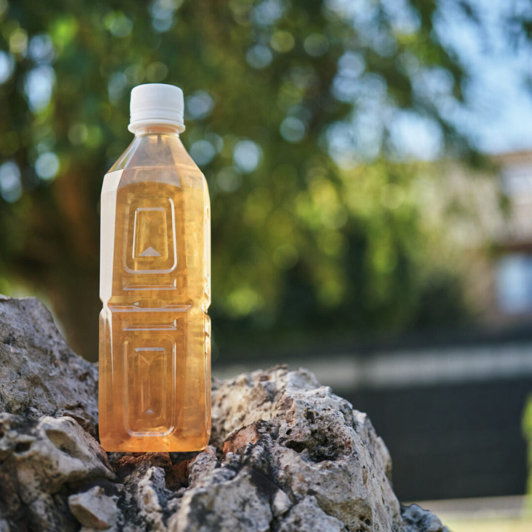 Beverage bottle in natural setting