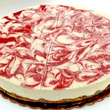Marble cheesecake with red swirls