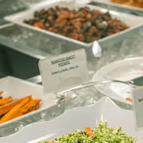 Diverse buffet selection with signs
